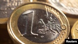 FILE PHOTO: One Euro coins are seen in this illustration