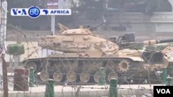 Army puts up a concrete wall around the presidential palace in Cairo after deadly clashes.
