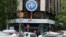 A TV crew works outside the Popular Party headquarters in Madrid, May 24, 2018. Spain's National Court has issued hefty prison sentences for politicians and business people involved in a kickbacks-for-contracts scheme that helped fund the ruling governing Popular Party.