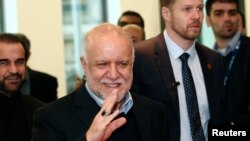 Iranian Oil Minister Bijan Zanganeh wave to journalists . 