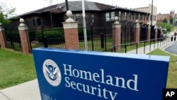 FILE - The Homeland Security Department headquarters in northwest Washington is seen June 5, 2015. The Trump administration has announced new rules for scrutinizing petitions to bring in minor spouses to the United States.