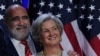 Campaign co-chairs Susie Wiles and Chris LaCivita listen as Donald Trump speaks at his election night rally at the Palm Beach County Convention Center in West Palm Beach, Florida, on Nov. 5, 2024.