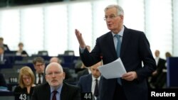 European Union's chief Brexit negotiator Michel Barnier delivers a speech during a debate on BREXIT after the vote on British PM Theresa May's Brexit deal, at the European Parliament, Strasbourg, France, Jan. 16, 2019. 