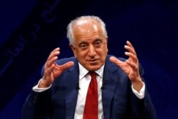 FILE - U.S. envoy for peace in Afghanistan Zalmay Khalilzad speaks during a debate at Tolo TV channel in Kabul, Afghanistan, April 28, 2019.