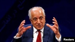 FILE - U.S. envoy for peace in Afghanistan Zalmay Khalilzad speaks during a debate at Tolo TV channel in Kabul, Apr. 28, 2019. 