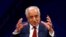 FILE - U.S. envoy for peace in Afghanistan Zalmay Khalilzad speaks during a debate at Tolo TV channel in Kabul, Apr. 28, 2019. 