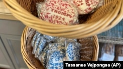 Cookies, with Harris and Trump labels on, are on display at Lochel's Bakery in the town of Hatboro in suburban Philadelphia, Tuesday, Sept. 24, 2024. (AP Photo/Tassanee Vejpongsa)
