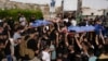 Mourners carry five Palestinian bodies during their funeral in Tubas, West Bank, Sept. 5, 2024. They were killed in an Israeli strike overnight, Palestinian health officials said. Another fighter was killed in an airstrike on the Al-Faraa refugee camp.