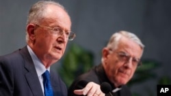 President of the Vatican tribunal judge Giuseppe Dalla Torre, left, and Padre Federico Lombardi, present legal reforms decided by Pope Francis, Vatican City, July 11, 2013.