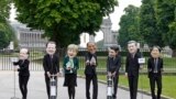 Oxfam&#39;s activists wear masks depicting leaders of the countries members of the G7, (L-R) French President Francois Hollande, British Prime Minister David Cameron, German Chancellor Angela Merkel, U.S. President Barack Obama, Italian Prime Minister Matteo Renzi, Canadian Prime Minister Stephen Harper and Japanase Prime Minister Shinzo Abe, during a protest called &quot;Energy dependency and wealth inquality&quot; outside the European Council in Brussels, Belgium.