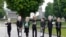Oxfam's activists wear masks depicting leaders of the countries members of the G7, (L-R) French President Francois Hollande, British Prime Minister David Cameron, German Chancellor Angela Merkel, U.S. President Barack Obama, Italian Prime Minister Matteo Renzi, Canadian Prime Minister Stephen Harper and Japanase Prime Minister Shinzo Abe, during a protest called "Energy dependency and wealth inquality" outside the European Council in Brussels, Belgium.