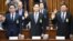 SK Group chairman Chey Tae-Won (from left) Samsung Electronics Vice Chairman Lee Jae-yong, and Lotte Group Chairman Shin Dong-Bin take an oath during a parliamentary probe into a scandal engulfing President Park Geun-hye at the National Assembly in in Seoul, Dec. 6, 2016. South Korea's most powerful business leaders from Samsung, Hyundai Motor and six other companies face grilling as lawmakers probe their links to a corruption scandal involving South Korea's president and her confidante.