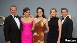 File - Actors Hugh Bonneville, Elizabeth McGovern, Michelle Dockery, Laura Carmichael and Allen Leech attend the world premiere of Downton Abbey in London, Britain, Sept. 9, 2019.