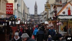 A Christmas market is crowded a day after a suspicious object was found in Potsdam, eastern Germany, Dec. 2, 2017. 