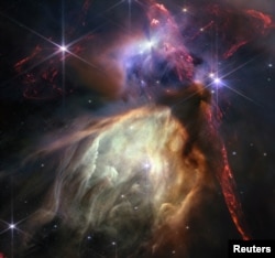 Kompleks awan Rho Ophiuchi, gugusan bintang terdekat dengan Bumi, terlihat dengan Teleskop Luar Angkasa James Webb menggunakan instrumen NIRCam yang dirilis 12 Juli 2023. (NASA, ESA, CSA, STScI, Klaus Pontoppidan and Alyssa Pagan/Handout via REUTERS)
