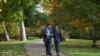 Mirza Dinnayi, left, and Lamia Haji Bashar walk in Stuttgart, Germany, Oct. 28, 2016. Bashar and Nadia Murad, who survived an ordeal at the hands of Islamic State jihadists, won the European Parliament's Sakharov human rights prize, Oct. 27, 2016.