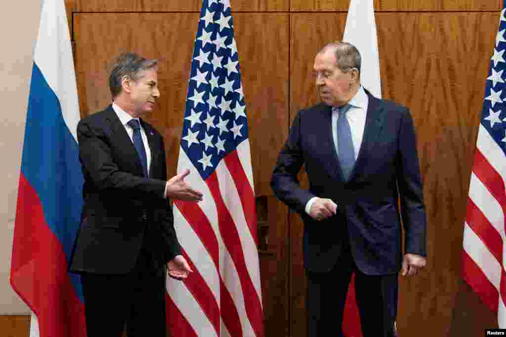 U.S. Secretary of State Antony Blinken greets Russian Foreign Minister Sergey Lavrov before their meeting, in Geneva, Switzerland.