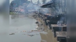 Nepal Cremates Victims, Coordinates Aid