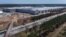 The construction site of the new Tesla Gigafactory for electric cars is pictured in Gruenheide near Berlin, Germany, Tuesday, April 27, 2021. Factories in Berlin and Austin, Texas, are on track to start producing this year. (AP Photo/Michael Sohn)