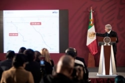 Mexico's President Andres Manuel Lopez Obrador shows a map of the area where members of a U.S. Mormon family were killed near the U.S. border, at the National Palace in Mexico City, Mexico, Nov. 5, 2019. (Presidential Press Office)