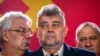 Romanian Prime Minister Marcel Ciolacu, of the Social Democratic Party or PSD, speaks after exit polls in the country's parliamentary elections, in Bucharest, Romania, Dec. 1, 2024.