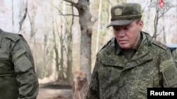 In this image taken from video released March 11, Chief of the General Staff of Russian Armed Forces Valery Gerasimo inspects troops involved in the Russia-Ukraine conflict, in the Kursk region of Russia. (Russian Defense Ministry/Handout via Reuters)