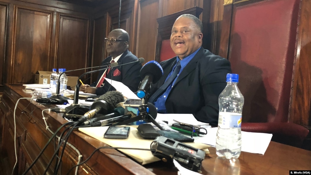 Japhet Murenje, the head of nomination court in Harare on June, 14, 2018, announces the names of the candidates who will run for Zimbabwe’s presidency in the July 30 general election. 