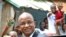 Candidate for the Guinean presidency Cellou Dalein Diallo smiles to the crowd, 27 Jun 2010