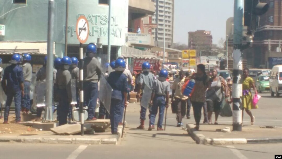 Zimbabwe police move in to arrest Pastor Ancellimo Magaya.