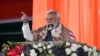 Perdana Menteri India Narendra Modi berpidato di Stadion Moulana Azad saat ia meresmikan beberapa proyek di Jammu dan Kashmir, di Jammu, India, 20 Februari 2024. (Foto: AP)