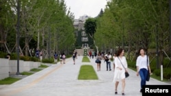 FILE - A student walks in the Yonsei University in Seoul, South Korea.