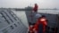 FILE - Navy soldiers stand on a landing craft during a military drill in Kaohsiung City, Taiwan on January 12, 2023. 