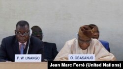 Former Nigerian President Olusegun Obasanjo (R) addresses a special UN Human Rights Council session on South Sudan in Sept. 2014, as South Sudan Justice Minister Paulino Waniwilla Unango listens. 