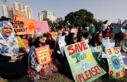 Activists call for action against climate change at a rally in Karachi, Pakistan, Sept. 20, 2019.