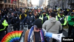 In photos: Trump protesters, supporters rally on Inauguration Day