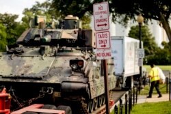 One of two Bradley Fighting Vehicles is parked near the Lincoln Memorial for President Donald Trump's 'Salute to America' event honoring service branches on Independence Day, July 3, 2019, in Washington.