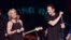 <em>X-Files</em> actor David Duchovny is joined by actress Gillian Anderson for a surprise performance of Neil Young's "Helpless" at The Cutting Room in New York, May 12, 2015, . Duchovny performed songs from his debut album <em>Hell Or Highwater</em>.
