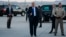 President Donald Trump gives a thumbs up as he arrives at McCarran International Airport for a campaign rally, Sept. 20, 2018, in Las Vegas.