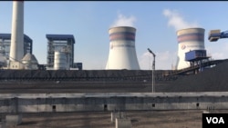 FILE - Port Qasim Power Plant, shown in theis 2019 photo, in the port city of Karachi is one of several coal-based production units China has built in Pakistan.