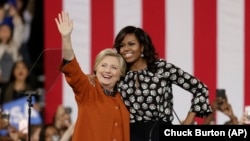 Michelle Obama and Clinton