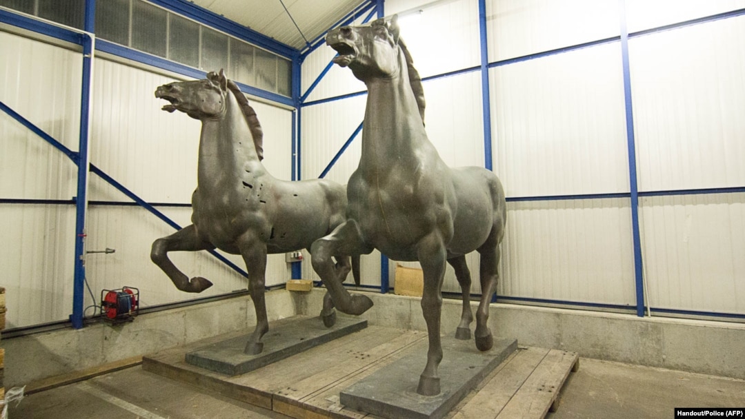 Horse sculptures "Walking Horses" by Austrian-German sculpturer Josef Thorak are shown in a police warehouse in Bad Bergzabern, central Germany, made available May 22, 2015. 