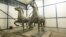 Horse sculptures "Walking Horses" by Austrian-German sculpturer Josef Thorak are shown in a police warehouse in Bad Bergzabern, central Germany, made available May 22, 2015. 