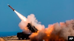 FILE - German soldiers assigned to a NATO installation in Greece fire the Patriot missile. (Sebastian Apel/U.S. Department of Defense, via AP, File)