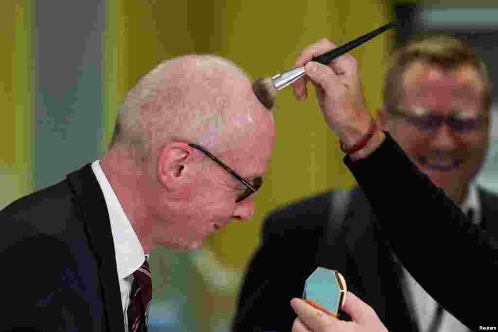 British MP Pat McFadden prepares to attend an interview at Britain&#39;s Labour Party&#39;s annual conference in Liverpool, Britain.