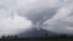 Gunung Semeru memuntahkan abu vulkanik saat erupsi dilihat dari Kabupaten Lumajang, Provinsi Jawa Timur, Senin, 6 Desember 2021. (AP Photo/Trisnadi)