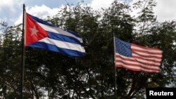 Flags of Cuba and the U.S. flutter in Havana, Cuba, Dec. 19, 2014. 