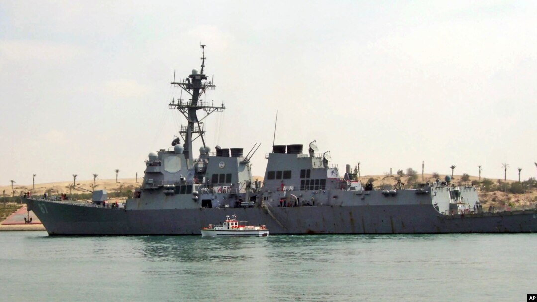FILE - The U.S. destroyer USS Mason sails in the Suez canal in Ismailia, Egypt, March 12, 2011. Two missiles fired from rebel-held territory in Yemen landed near the destroyer in the Red Sea.