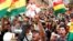 People shout slogans during a protest against Bolivia's President Evo Morales in La Paz, Bolivia, November 9, 2019. 