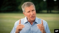 In this image from video, former Republican Ohio Gov. John Kasich speaks during the first night of the Democratic National Convention on Aug. 17, 2020. 