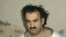 A photo of alleged Sep 11, 2001 mastermind Khalid Sheikh Mohammed soon after he was arrested (file photo)